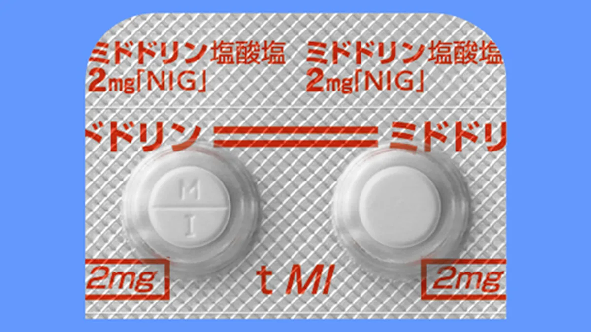 医生正在向类风湿关节炎患者解释巴瑞克替尼2mg的疗效和注意事项